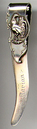 This bookmark was made in the US by an unknown manufacturer. It is marked only Sterling and is identical to bookmarks 133, 241 and 290 except for the design on the top blade. In this case, the design is of a bird. The date is 1900 - 1910.