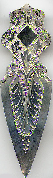 This bookmark was made in a European country probably between 1900 and 1910. It is marked only 900, not quite sterling. It is a fairly large bookmark with an art nouveau design on the top.
