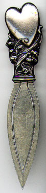 This bookmark was made in the US. It is unmarked except for the word sterling on the back of the top and was manufactured by Webster Company in 1913 and was sold as a letter opener. The top is a heart with flowers. The blades are silver plate.  