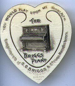 This bookmark was made in the US as an advertisement for C. C. Briggs & Co. Piano Manufacturers in Boston. It is made of celluloid in the shape of a heart. The center blade has a very detailed engraved picture of an upright piano. The top is engraved "You would play upon me." Hamlet, Act III. The celluloid has a faint wood grain. The date is 1910 - 1930.  