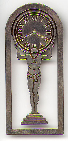 This bookmark was made in the US by Tiffany an Co. It is marked Tiffany and Co. and Sterling Silver. It is in the shape of Atlas holding a clock on his shoulders. It is probably from 1940 - 1950.  