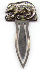 This bookmark was made in the US by Unger Brothers. It is marked with the makers hallmark surrounded by Sterling 925 Fine. The top of the bookmark is an opossum. The date is 1900 - 1910.