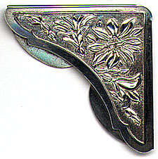 This bookmark is American made by The Gorham Corporation. It is marked Gorham Sterling 1399. It is a corner bookmark with a floral design. The date is 1930 - 1950.