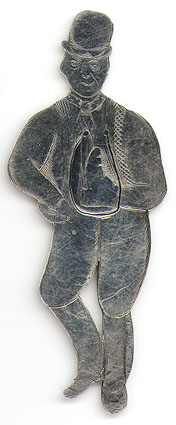This bookmark was made in the US by J. F. Fradley & Co., a small New York silver manufacturer in business from 1870 - 1936. It is in the shape of a man, Sam Weller, the servant of Samuel Pickwick from the book The Pickwick Papers by Charles Dickens. It is marked Sterling, the cross hallmark, 1863 and 2. Also inscribed on the back is "Sam Weller". Date is 1890 - 1936.  