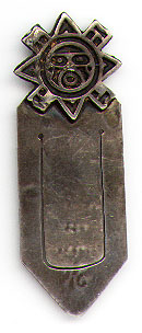 This bookmark was made in Mexico between 1930 and 1940. It is marked Hecho en Mexico, 0925, Citlali and some kind of design hallmark. It also has the eagle hallmark with the number 214. The top is an Aztec design.