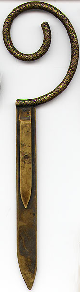 This bookmark was made in an unknown country by an unknown manufacturer. It is large and heavy and made of solid brass. It is more of a letter opener then a bookmark but it does have two blades. The top is a curled brass cord with an intricate design. Date is unknown.