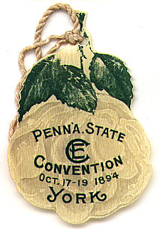  This bookmark was made in the US and is a celluloid advertisement for the Penna. State Convention. It is probably more of a hang tag than a bookmark. It has a picture of green leaves on the top and a faded gray rose as the background. The date is 1894.   