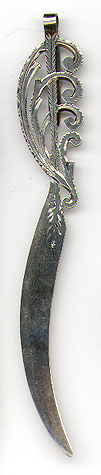 This bookmark was made in the US by Codding Bros & Heilborn between 1880 and 1890. It is marked C B & H Sterling on the back. The top is in the shape of a feather. This was probably used as a paper cutter as well as a bookmark.