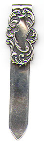  This bookmark was made in the US by the Webster Company between 1900 and 1910. It is marked Webster Company and the triangle hallmark and 925 Sterling. It is a small bookmark with the top blade having an art nouveau design.  