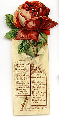  This bookmark was made in the US by David C. Cook Publishing of Elgin, IL. It is a religious celluloid bookmark with a picture of a rose on top and a quote from Exodus XX 2-17. The date is 1905 - 1915.    
