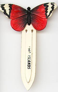  This bookmark was made in Germany. It is a butterfly with red, black and white wings. The inner blade says "1000 Islands" and the back is marked Germany. The date is 1920 - 1930.     