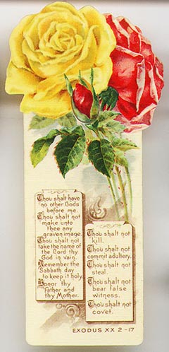  This bookmark was made in the US by David C. Cook Publishing. It is a celluloid religious bookmark with two Roses, one yellow and one red on the top and a quote from the Bible of Exodus XX 2-17 the ten commandments. The date is 1905 - 1915.    