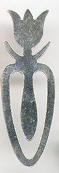  This bookmark was made in the US by an unknown manufacturer. It is only marked sterling on the back. The top is a figural tulip flower. The date is 1960 - 1970.  