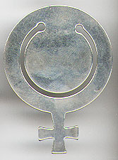 This bookmark was made in the US by Tiffany & Co. It is marked Tiffany & Co. Makers Sterling on the back. It is in the shape of the Female symbol of a circle and a cross. The date is 1960 - 1970.   