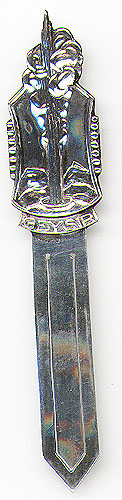This bookmark was made in a Scandinavian country, possibly Denmark between 1910 - 1920. It depicts an erupting geyser on the top. It is marked 830S and SS. The front says "Geysir".   