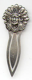 This bookmark was made in the US by Unger Bros. It is marked with the manufacturers mark of an intertwined U and B surrounded by Sterling 925 Fine. It is a figural of an Indian head with full feather head dress. The front is inscribed with the initials A.F.C. This is a very rare piece.  