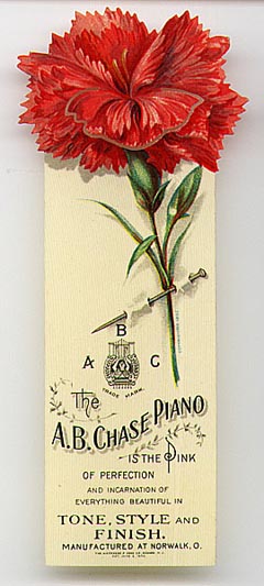  This bookmark was made in the US by Whitehead and Hoag Co. of Newark, NJ. It a celluloid advertising bookmark for the A.B. Chase Piano. It has a red carnation flower on top which is marked copyright 1902. The patent for this bookmark is dated 1905.  