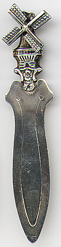 This bookmark was made in Holland. It is marked GN Gero 90 on the back. The top is a figural windmill where the blades move. This is either silver or silver plate. The date is 1950 - 1960.