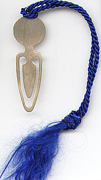  This bookmark was made in the US by J.T. Inman & Co. It is marked Inman Sterling and was made circa 1930 - 1940. It is a very plain and small piece with a blue tassel.  
