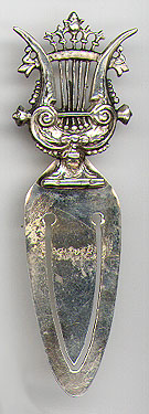 This bookmark was probably made in a Spain. It is marked sterling 925 and has a figural lyre on top. The date is unknown.