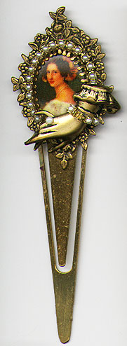  This bookmark was made in the US by combining a brass blank bookmark with some old costume jewelry. It was made in 1997 in West Palm Beach, FL.  