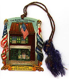  This bookmark was made in the US by an unknown manufacturer. It is a celluloid souvenir for the Betsy Ross house in Philadelphia. It is a colorful drawing of the house with a flag as the cutout for the place to clip the page. The date is 1900 - 1910.   