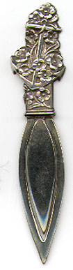 This bookmark was made in the US by the Webster Company. It was made between 1910 - 1920 and was originally sold as a letter opener. The top is an anchor with flowers. It is marked only sterling on the back.  