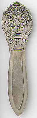This bookmark was made in a European country between 1930 - 1940. It is marked 830S and has an unidentified makers mark. The top is a pot with flowers. It is a very thin bookmark. 