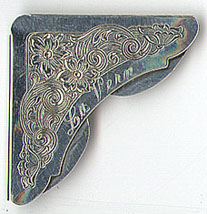 This bookmark is American made by The Gorham Corporation. It is marked Gorham Sterling 70. It is a corner bookmark with a floral design. The date is 1960 - 1970.