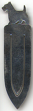 This bookmark was made in the US by Frank W. Smith. It is marked Sterling SCOTTIE and the manufacturers hallmark. The top is a figural of a Scottie dog. The date is 1930 - 1940.  