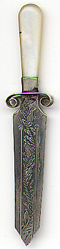 This bookmark was made in the US by an unknown manufacturer. It is marked only Sterling and is engraved May 31, 1894. It is in the shape of a knife or sword with a mother-of-pearl handle. 
