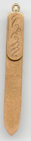 This bookmark was made in the US by Tiffany & Co. It is marked Tiffany & Co, 14Kt and the letter M. It is a simple yet elegant piece with the initials CSM on the top blade. The date is 1900 - 1910. 