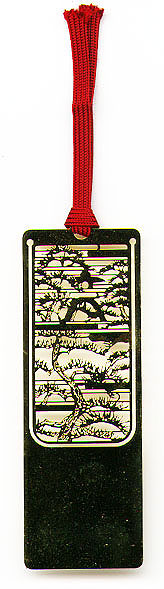 This bookmark was made in Japan. It is marked 24KGP for 24 karat gold plate. It is a very delicate cut-out design of an old tree. The date is 1998.