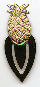 This bookmark was made in the US by an unknown manufacturer in 1999. It has a pineapple on the top and is gold plated.  