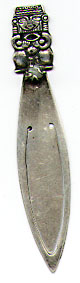 This bookmark was made in a South American country or Guatemala. It is marked 900 on the back for 900 fine silver. (Sterling is 925). It is an Aztec figural on the top with a piece of unpolished turquouise. The date is 1960 - 1970.  