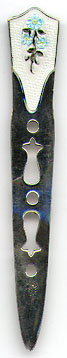 This bookmark was made in the US by Webster Company. It is marked Sterling and has the manufacturers hallmark. It is actually most likely not a bookmark but a small letter opener. It has an enamel shield on top and cutouts in the blade. The date is 1900 - 1910.  