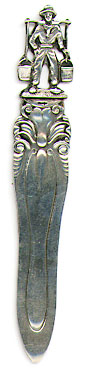 This bookmark was made in Holland and has a man carrying water buckets on the top.  The mark on it is a sword tilted slightly to the left. This inicates the fineness of the silver to be between .934 and .833. The mark was used until 1953.