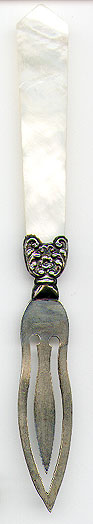 This bookmark was made in the US by an unknown manufacturer. It is marked Sterling Top. The top is a blade of mother of pearl, which could be used as a page cutter.  The date is 1900 - 1910.