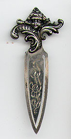 This bookmark was made in the US by William B. Kerr & Co. It is marked sterling 8 on the back. The top is a figural cherub  head. The date is 1900 - 1910.