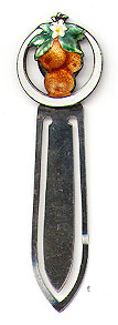 This bookmark was made in the US by F.A. Hermann Co. It is marked with the makers mark and sterling. The top is enameled oranges and leaves with an orange blossom   surrounded by a circle of white enamel. The date is 1900 - 1910.