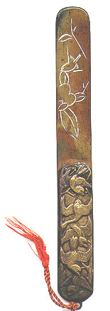 This bookmark was made in Japan. It is brass and has a high relief pictures of birds. The date is 1900 - 1910.