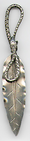 This bookmark was made in the US by Gorham. It is marked with the Gorham hallmark and Sterling and 49. The top is a figural snake and the bottom blade is a leaf. This is from the Autumn 1888 Gorham catalog where they sold 33 different bookmarks.  