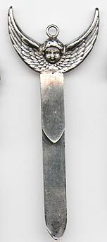This bookmark was made in the US by an unknown manufacturer. It is possibly Shiebler. It is marked Sterling 1638 on the back. The top is the face of an angel with finely detailed expanded wings. The date is 1880 - 1900.  