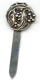 This bookmark was made in the US by Unger Bros. It is marked with the makers hallmark and Sterling 925 Fine. It is an art nouveau flower design. This bookmark was sold from the 1904 Unger Bros. catalog. 