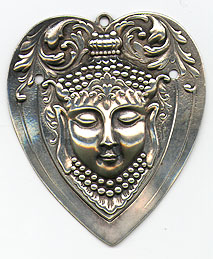 This bookmark was made in the US by Gorham. It is marked with the makers hallmark, the date mark for 1888 and the number 55. It is a heart shaped bookmark with a high relief mask of an Asian/Indian woman.