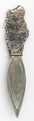 This bookmark was made in the US by Webster Co. It is marked sterling and the hallmark for Webster. The top is a figural flower and this was sold as a letter opener in the 1913 Webster catalog.