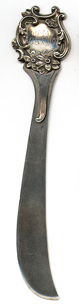 This bookmark was made in the US by Bay State Silver Co from North Attelboro, Mass. It is marked with the makers hallmark of an arrow through a box with the initals BS and the word sterling. It is an art nouveau shield design. The date is 1890 - 1893.