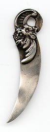 This bookmark was made in the US by Gorham. It is marked with the makers hallmark, sterling and the number 32. It is in the shape of a bouquet of flowers.  It is one of 33 bookmarks sold in the Autumn 1888 silver catalog. 