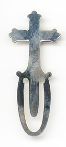 This bookmark was made in the US by Webster Co. It is marked with the makers hallmark and Webster Sterling. It is a simple bookmark of a figural cross. The date is 1920 - 1930.