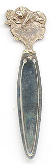 This bookmark was made in Holland. It has Dutch hallmarks indicating a date before 1953 and a manufacturers mark of HH. The top is a lion resting on a shield which says Lowendenkma Luzern.